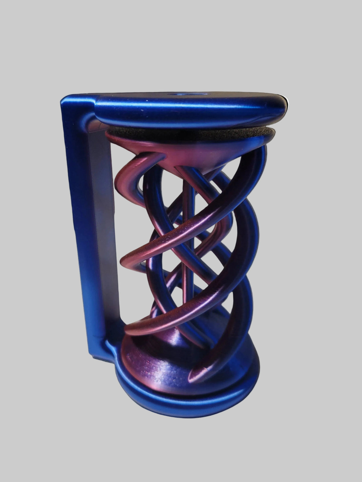 Blue to Purple Silk color-shifting 3D-printed spinning helix desktop fidget with a handle and twisted rotating center on a light grey backdrop.