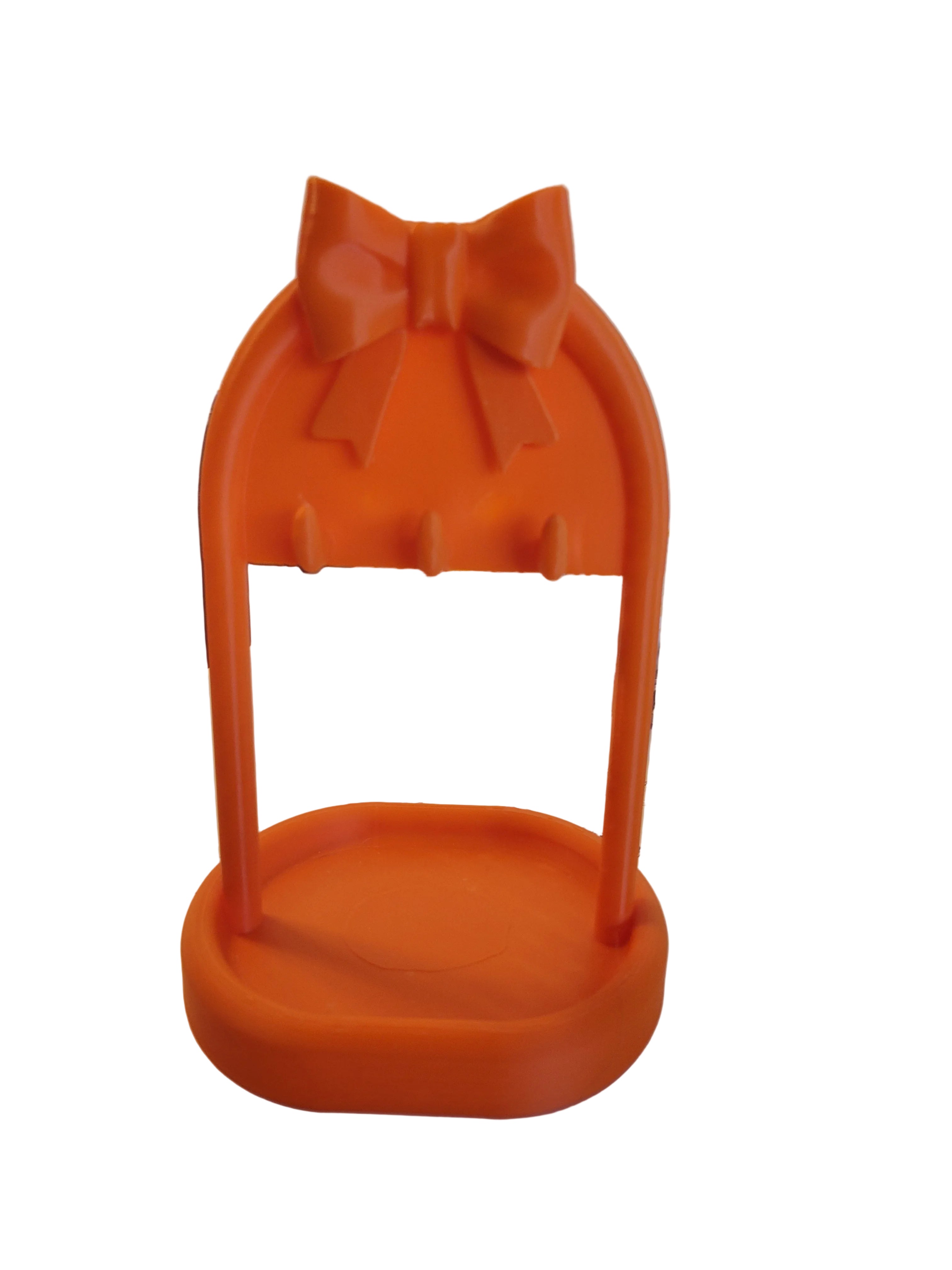 Sunset Orange 3D-printed jewelry stand with 3 hooks and bottom tray crowned with a bow on top set with a white background.