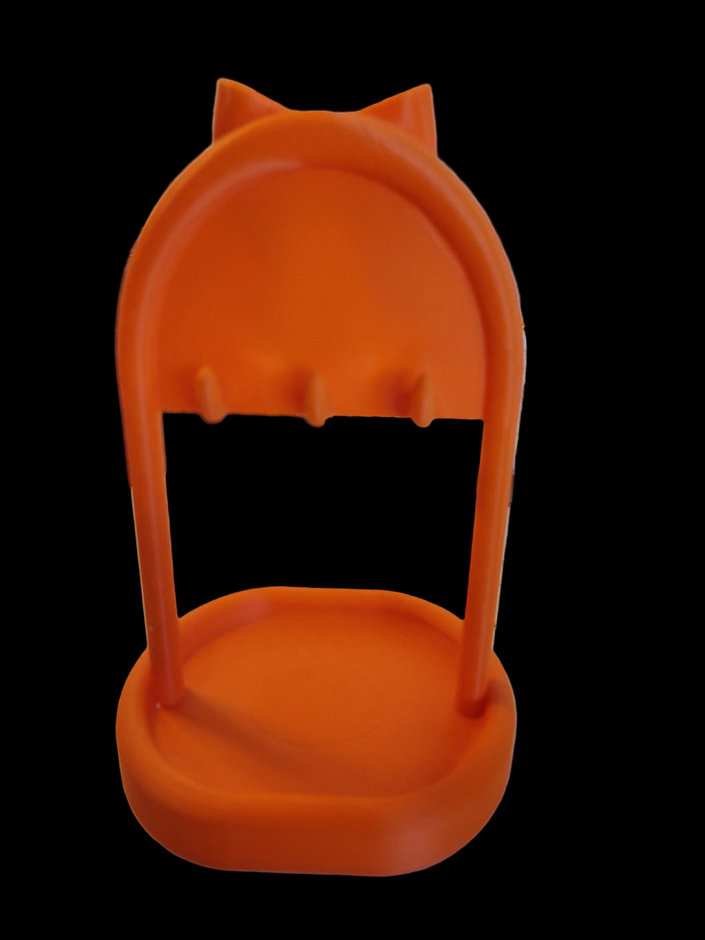 Sunset Orange 3D-printed jewelry stand back view with 3 more hooks and bottom tray crowned with ribbon on a black backdrop.