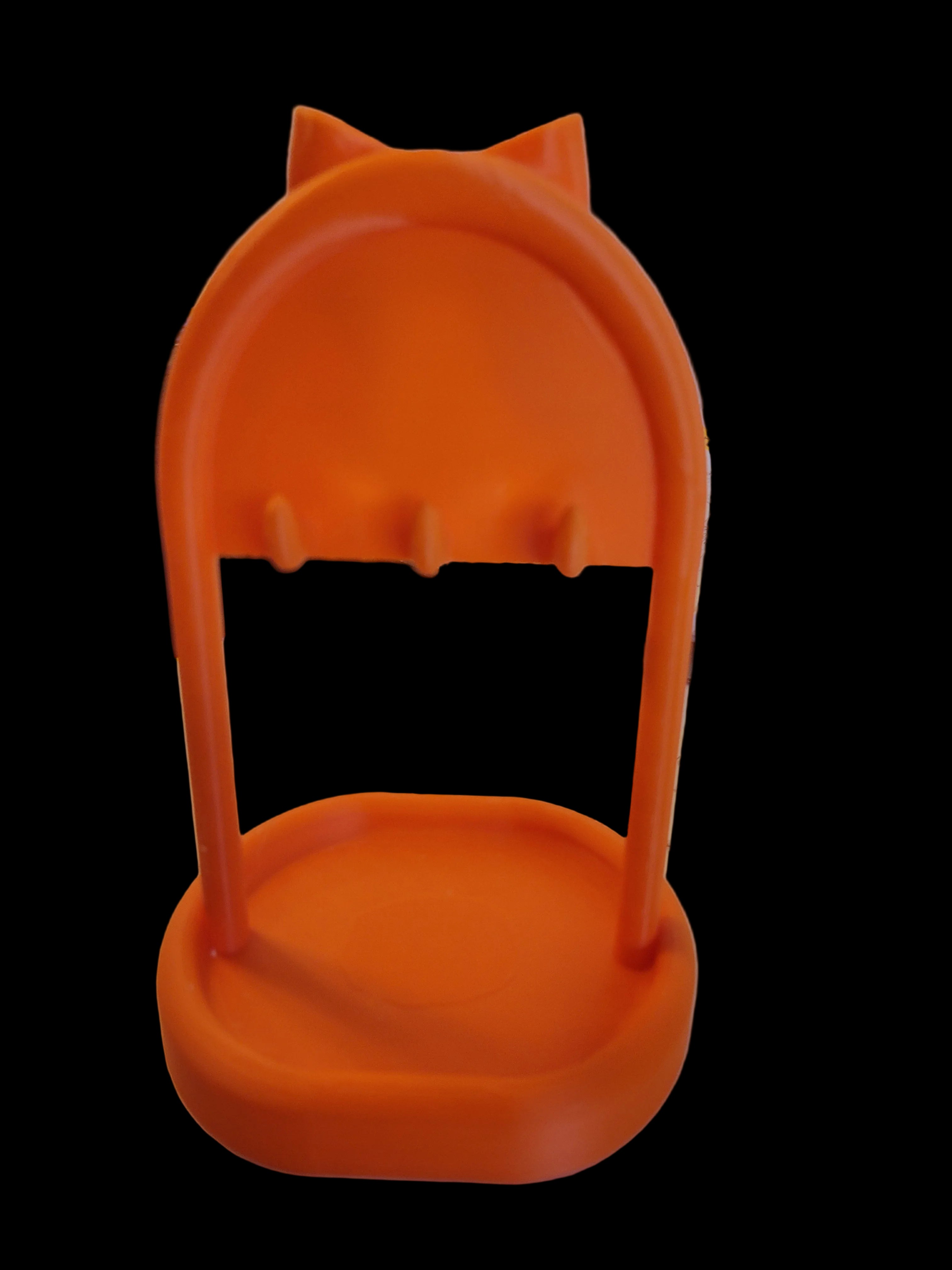 Sunset Orange 3D-printed jewelry stand back view with 3 more hooks and bottom tray crowned with ribbon on a black backdrop.