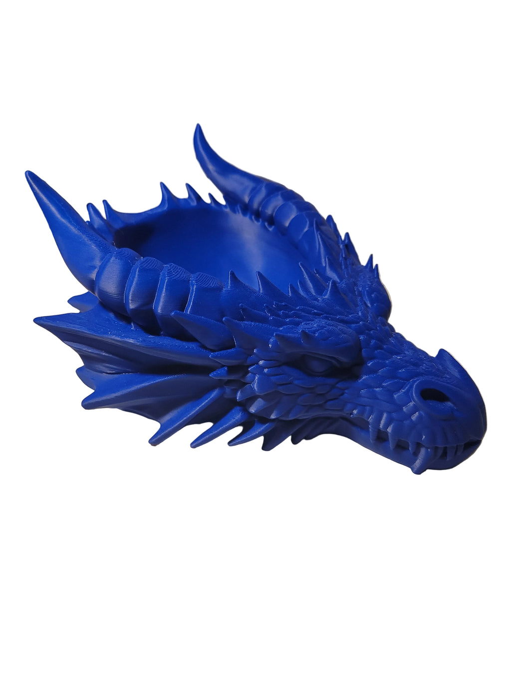 Cobalt Blue 3D-printed catch-all tray designed with scaling features that accent its teeth and intricate horns on white backdrop.