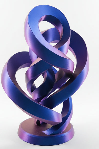 Blue to Purple Silk color-shifting 3D-printed curvy infinity sculpture with twisting intertwined loops on white background.
